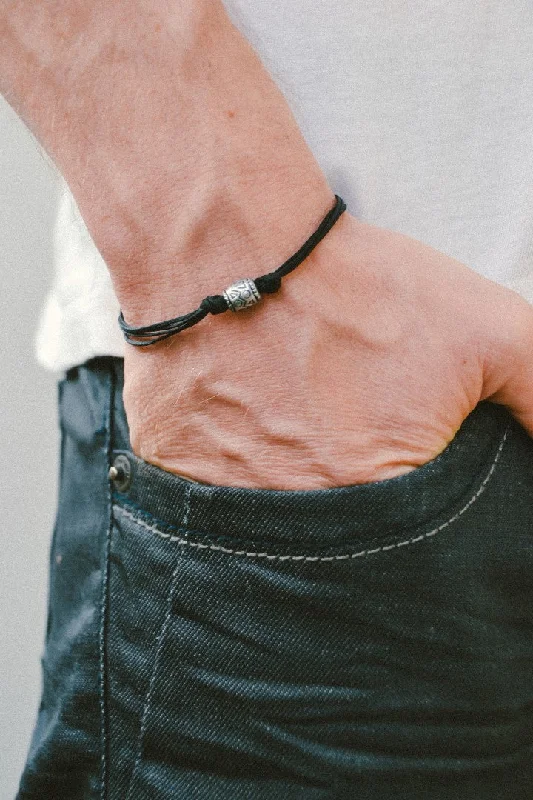 women’s vintage-inspired jewelry for unique looks -Men's bracelet with a silver aztec tribal bead and a black cord